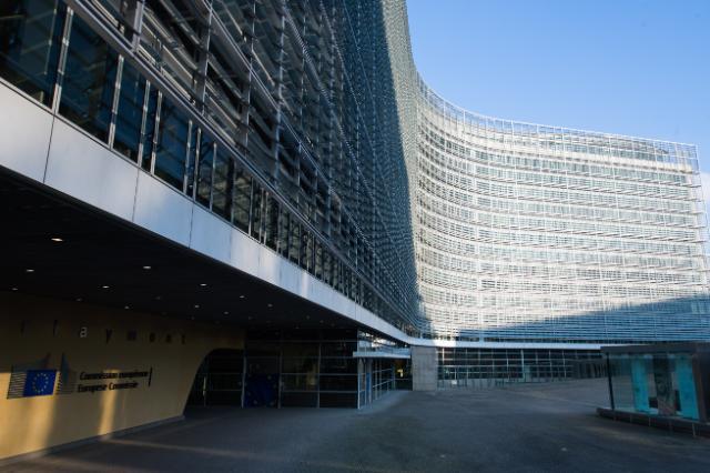 Views of European flags in front of the Berlaymont building in Brussels
